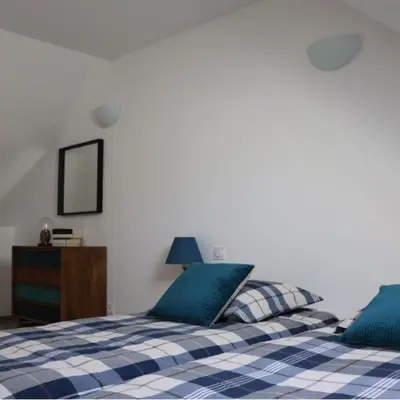 Un ou plusieurs lits dans un hébergement de l'établissement Maison Lumineuse à Boulieu