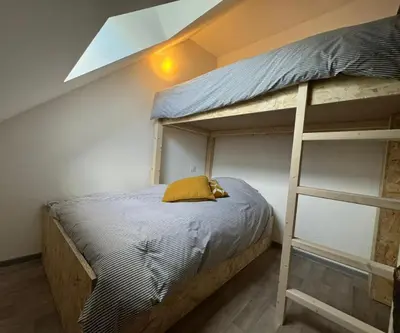 Un ou plusieurs lits dans un hébergement de l'établissement Maison Lumineuse à Boulieu