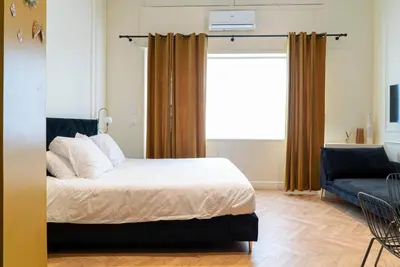 Un ou plusieurs lits dans un hébergement de l'établissement Suite Medici