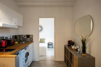 Cuisine ou kitchenette dans l'établissement Le Bollier - Charmant appartement au calme