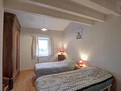 Un ou plusieurs lits dans un hébergement de l'établissement Charmant gîte au cœur du Pilat avec wifi et cheminée - FR-1-496-255