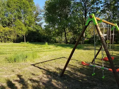 Aire de jeux pour enfants de l'établissement LE SECRET DU CHEMIN confort, détente et loisirs