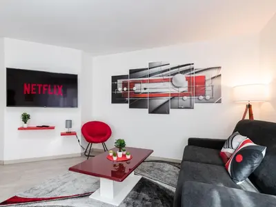 Coin salon dans l'établissement LE STELLA - HYPERCENTRE GARAGE GRATUIT WiFi NETFLIX AMAZON PRIME PROCHE PARC TETE D'OR