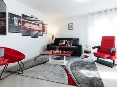 Coin salon dans l'établissement LE STELLA - HYPERCENTRE GARAGE GRATUIT WiFi NETFLIX AMAZON PRIME PROCHE PARC TETE D'OR
