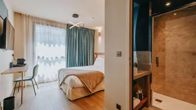 Un ou plusieurs lits dans un hébergement de l'établissement Keystone Hôtel & Spa