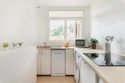 Cuisine ou kitchenette dans l'établissement APPART COSY - COMME À LA MAISON - ST ETIENNE