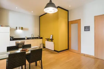 Cuisine ou kitchenette dans l'établissement Honorê - Suites Bellecour