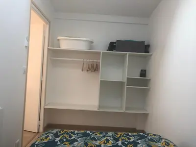 Un ou plusieurs lits dans un hébergement de l'établissement Appartement paisible proche centre ville