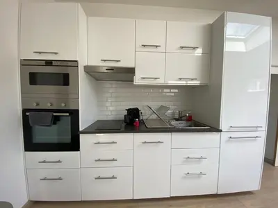 Cuisine ou kitchenette dans l'établissement Appartement paisible proche centre ville