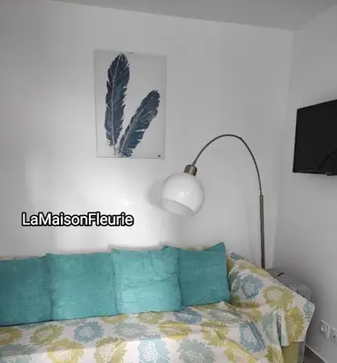 Un ou plusieurs lits dans un hébergement de l'établissement MaisonFleurie