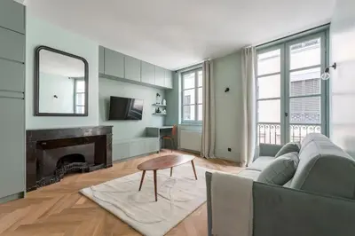 Télévision ou salle de divertissement dans l'établissement HAMAC Suites Suite St Antoine 2 CH Unique