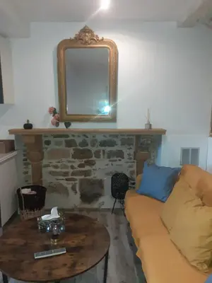 Coin salon dans l'établissement Trévoux: loft ravissant avec terrasse