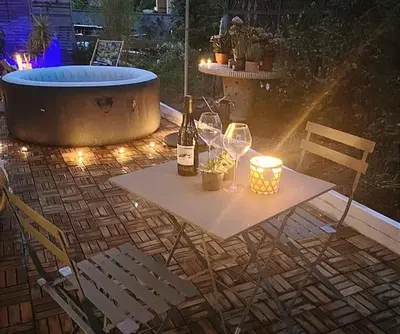 Boissons dans l'établissement Superbe appartement avec jacuzzi avec jardin privé
