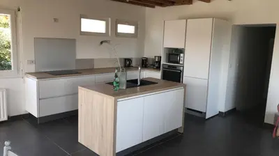 Cuisine ou kitchenette dans l'établissement Bald'Home côté jardin