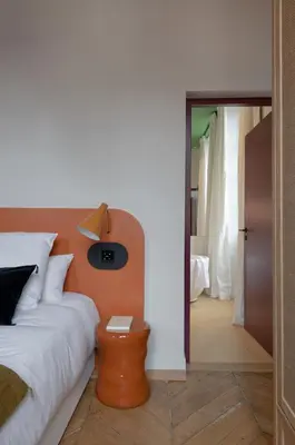 Un ou plusieurs lits dans un hébergement de l'établissement MiHotel Blandan