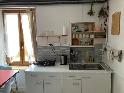 Cuisine ou kitchenette dans l'établissement Gite cosy 25 min Lyon Vienne St Etienne