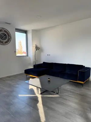 Coin salon dans l'établissement Loft épuré avec parking privé.