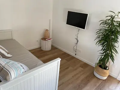 Télévision ou salle de divertissement dans l'établissement Villa poétique proche de Lyon