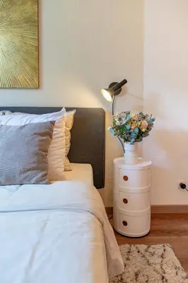 Un ou plusieurs lits dans un hébergement de l'établissement Lyon centre appartement meublé