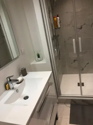 Salle de bains dans l'établissement L Ancien Canut Cosy