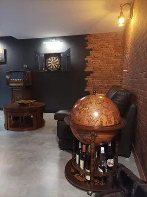 Coin salon dans l'établissement Chambre d'hôte avec Hammam et salle de jeux
