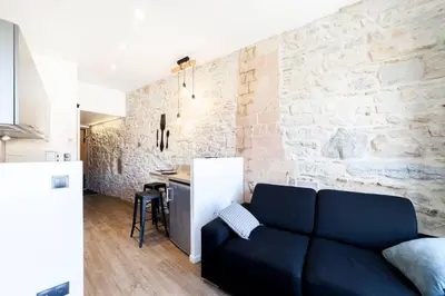 Coin salon dans l'établissement AllinLyon | Charme & vue sur Saône
