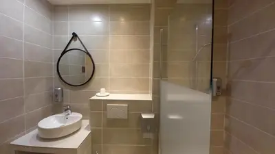 Salle de bains dans l'établissement Etesia