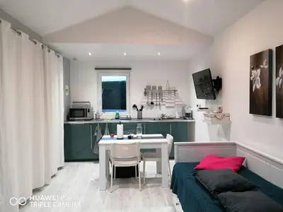 Cuisine ou kitchenette dans l'établissement Petit nid douillet