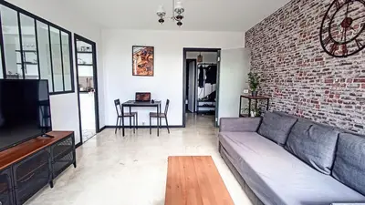 Coin salon dans l'établissement Logement entier proche de Lyon