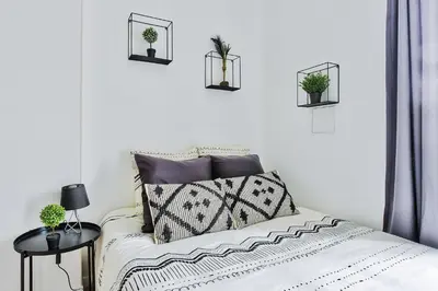 Un ou plusieurs lits dans un hébergement de l'établissement Appartement Le Cocon Lyonnais