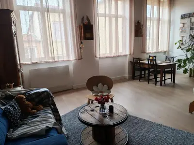 Coin salon dans l'établissement Lyon:superbe canut duplex périmètre Unesco