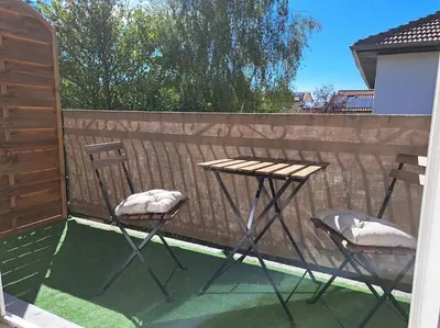 Balcon ou terrasse dans l'établissement Studio dans maison avec jardin et balcon, au calme