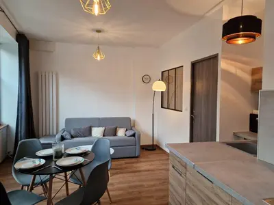Coin salon dans l'établissement l'Appart des Pierres Dorées
