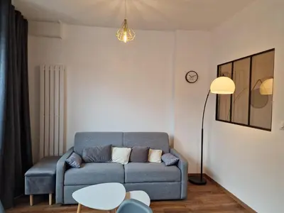 Coin salon dans l'établissement l'Appart des Pierres Dorées
