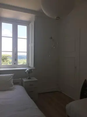 Un ou plusieurs lits dans un hébergement de l'établissement Grand appart 150m2 dans belle maison bourgeoise