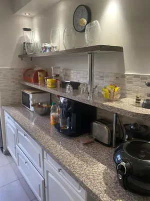 Cuisine ou kitchenette dans l'établissement Zola