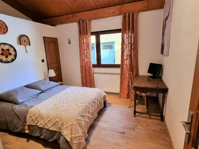 Un ou plusieurs lits dans un hébergement de l'établissement Le Chalet