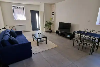 Coin salon dans l'établissement Beau Appartement T2