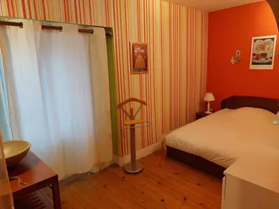 Un ou plusieurs lits dans un hébergement de l'établissement Maison de famille en Beaujolais vert