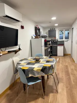 Cuisine ou kitchenette dans l'établissement Les Gîtes de la Bergerie - Boule de Neige