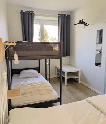 Un ou plusieurs lits dans un hébergement de l'établissement comme à la maison