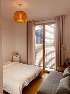 Un ou plusieurs lits dans un hébergement de l'établissement Appartement T3 Confluence