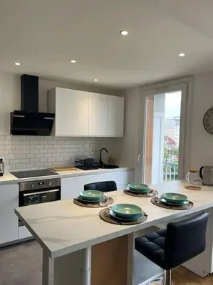 Cuisine ou kitchenette dans l'établissement Chambre privée dans un appartement partagé