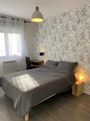 Un ou plusieurs lits dans un hébergement de l'établissement Sleep In La Mulatière