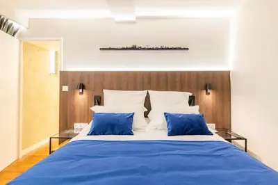 Un ou plusieurs lits dans un hébergement de l'établissement Cocoon du vieux Lyon - Luxury apartment - Balneo