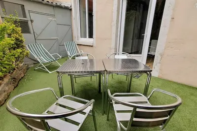 Terrasse ou espace extérieur de l'établissement Classé 4 étoiles - Cybèle - Centre ville 2 Chambres, cour privative et Garage