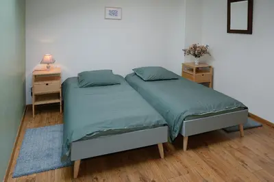 Un ou plusieurs lits dans un hébergement de l'établissement Auberge du Vieux Pont
